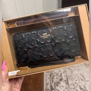 Coach wrist wallet with Cs and two straps